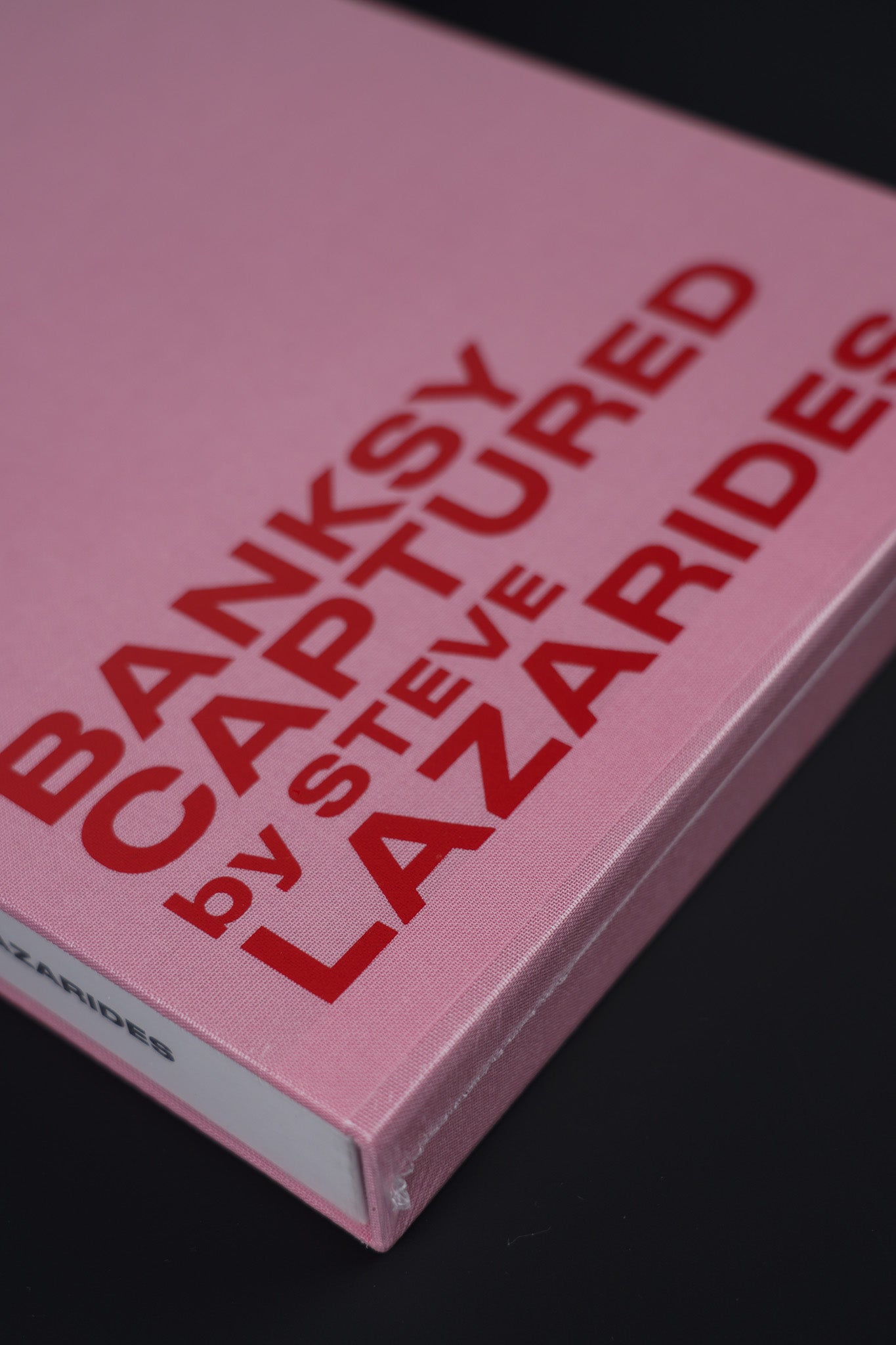 Fully sealed Banksy Captured Volume 2 by Steve Lazarides in its pink slipcase, ready for collectors.