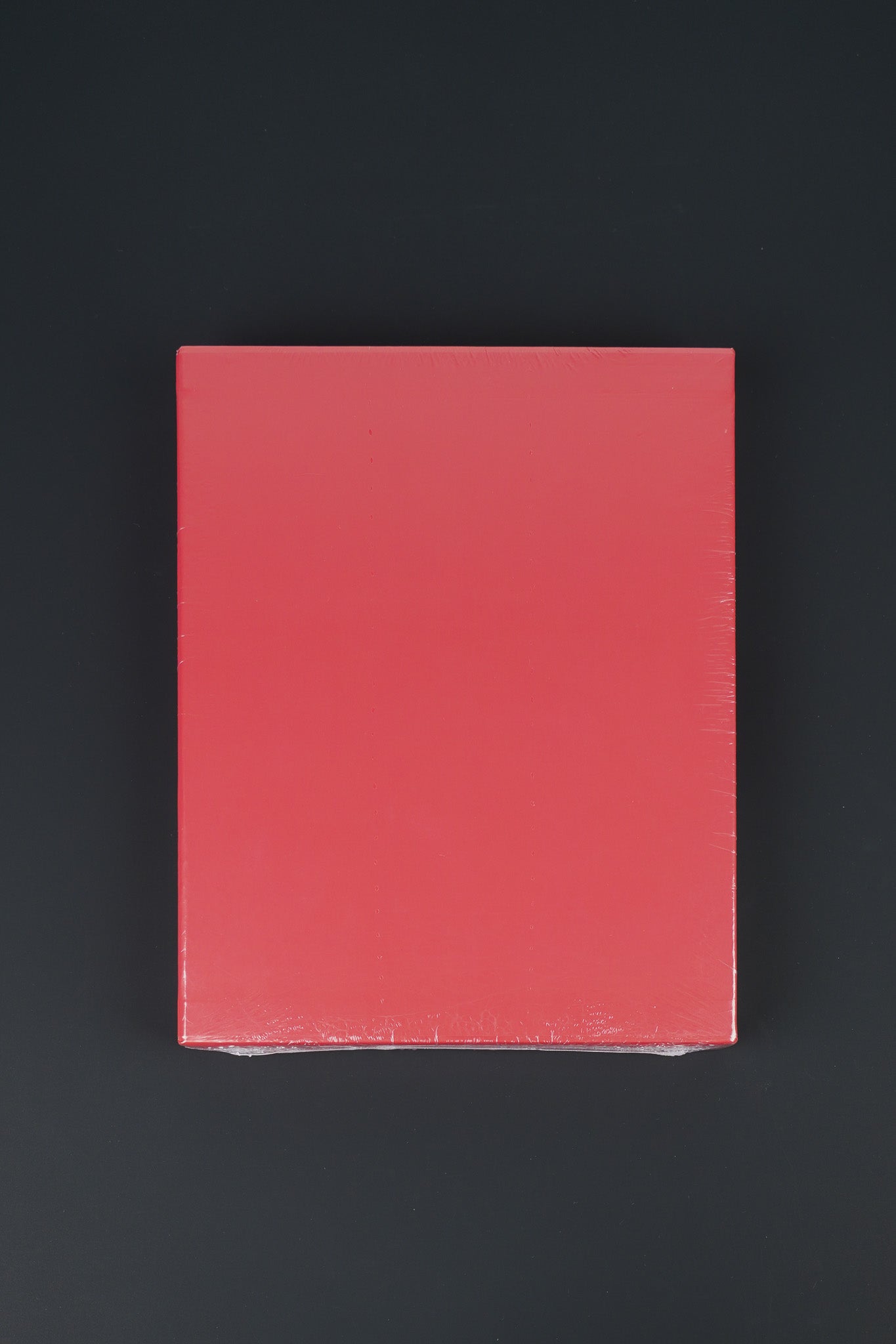 Rear view of the limited Banksy Captured hardcover edition in a bold red slipcase.