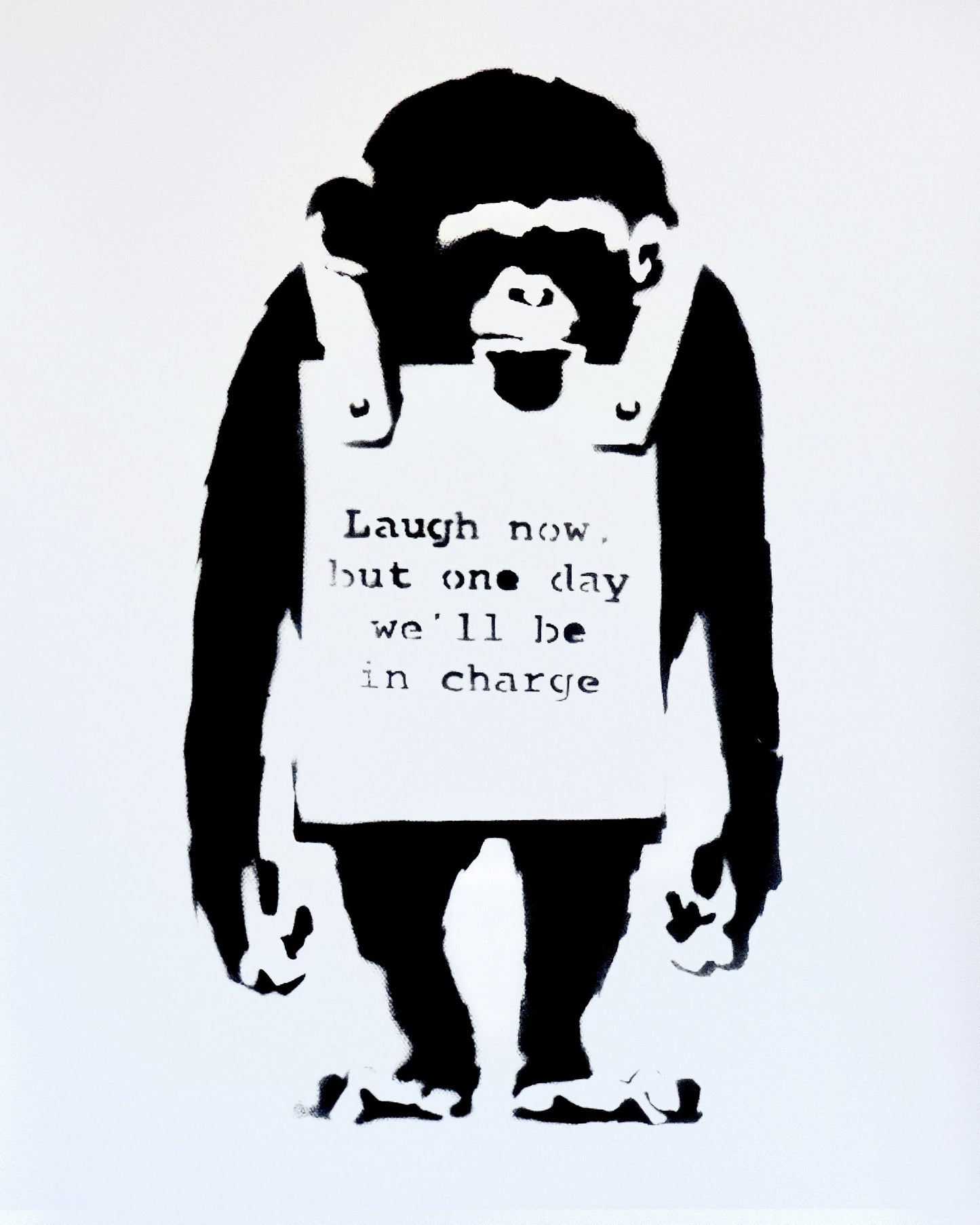 High-quality image of Banksy's 'Laugh Now' print, featuring a monkey with a sign that reads 'Laugh now, but one day we'll be in charge.'