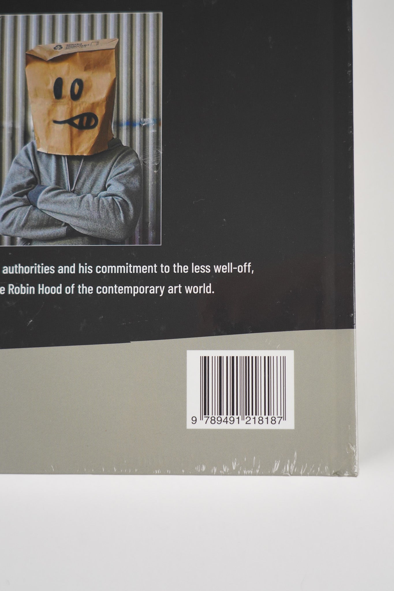 Detailed close-up of the lower section of the back cover of "Banksy: The Walled Off Art Editions Are Sold Out" where barcode is visible.