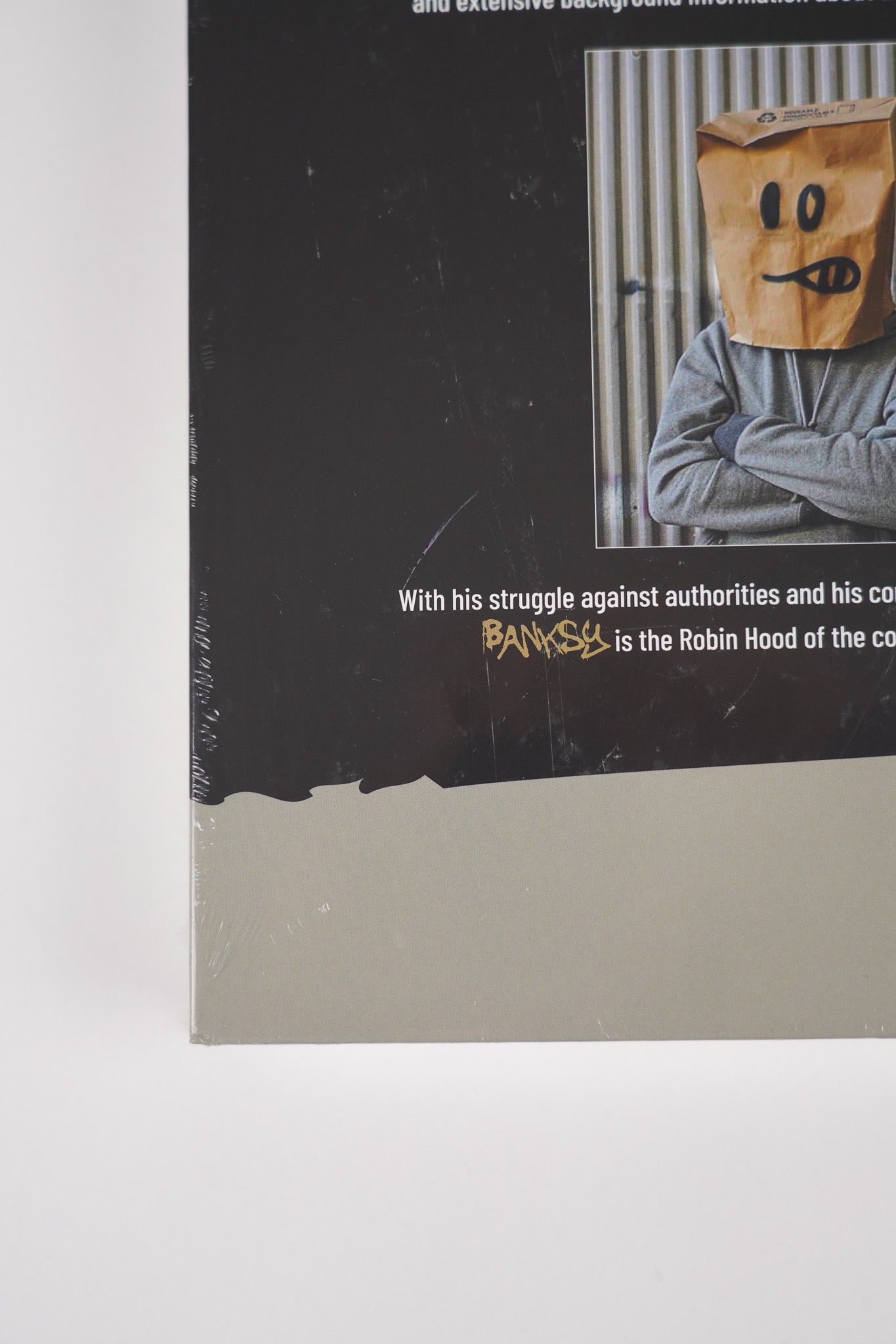 Detailed close-up of the lower section of the back cover of "Banksy: The Walled Off Art Editions Are Sold Out."