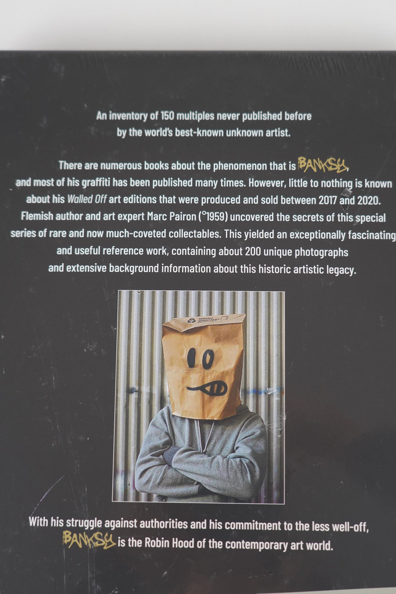 Close-up of the summary text on the back cover of "Banksy: The Walled Off Art Editions Are Sold Out" detailing the book’s description.