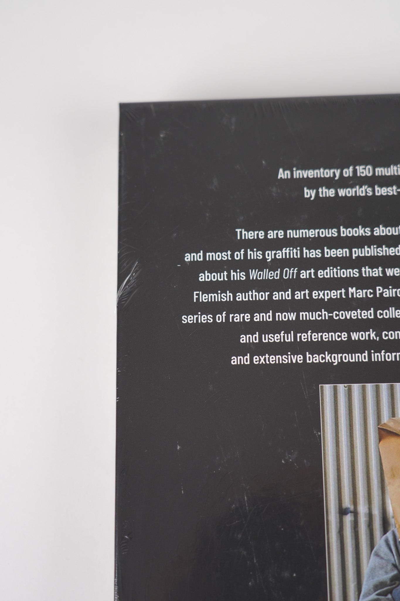 Close-up of the summary text on the back cover of "Banksy: The Walled Off Art Editions Are Sold Out" detailing the book’s description.