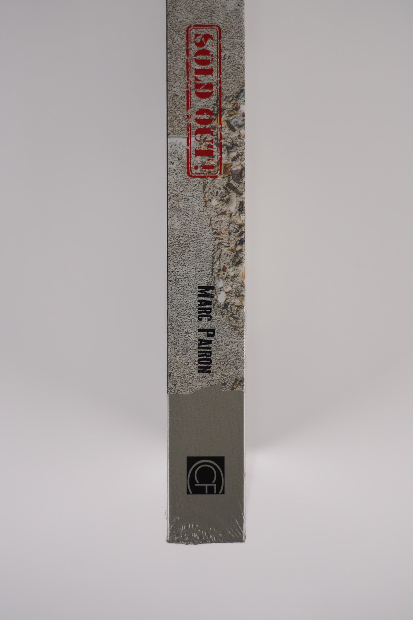 Bottom of the spine of "Banksy: The Walled Off Art Editions Are Sold Out" displaying binding and craftsmanship.