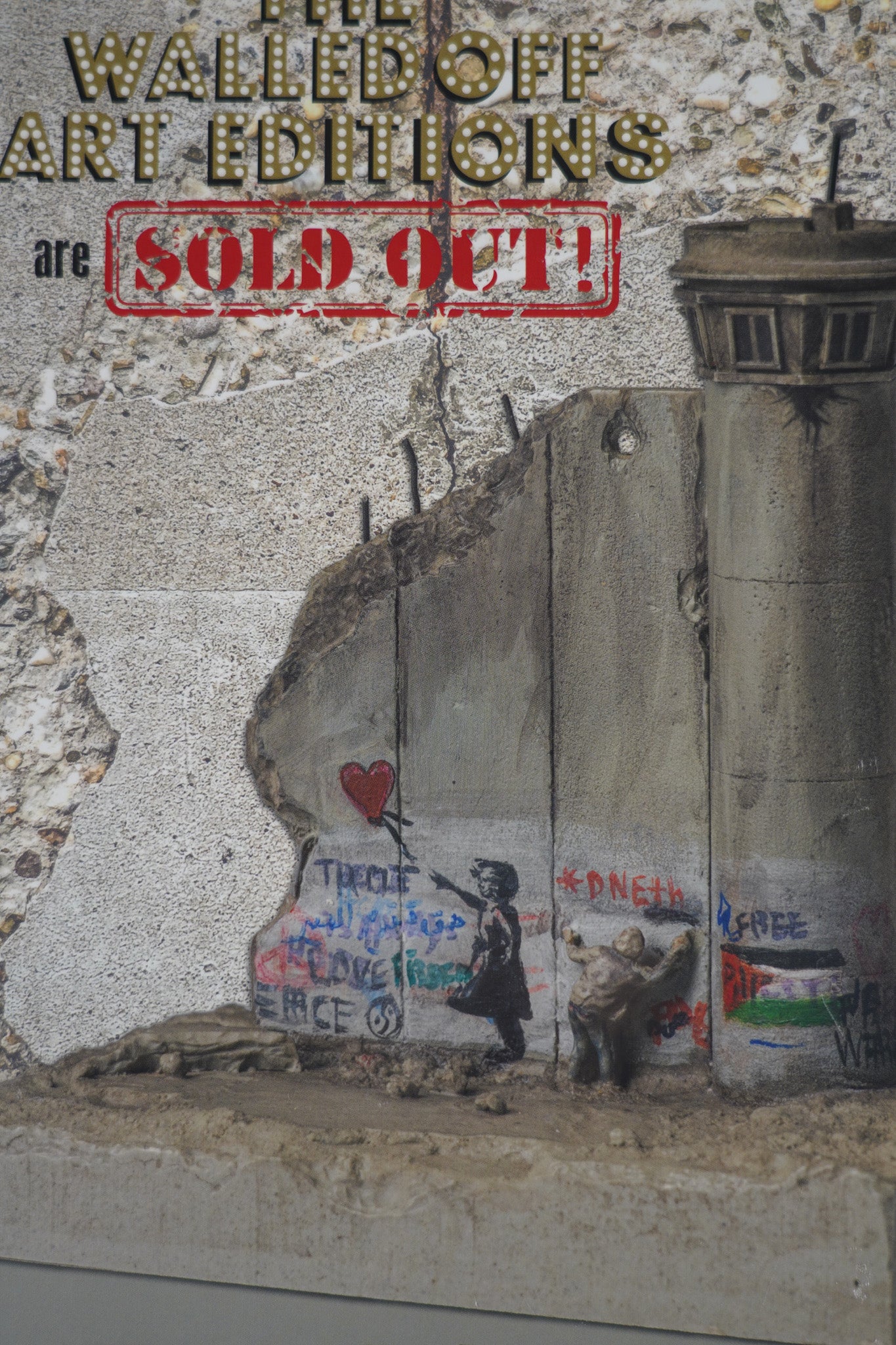 Detailed view of the artwork on the front cover of "Banksy: The Walled Off Art Editions Are Sold Out" showing design intricacy.