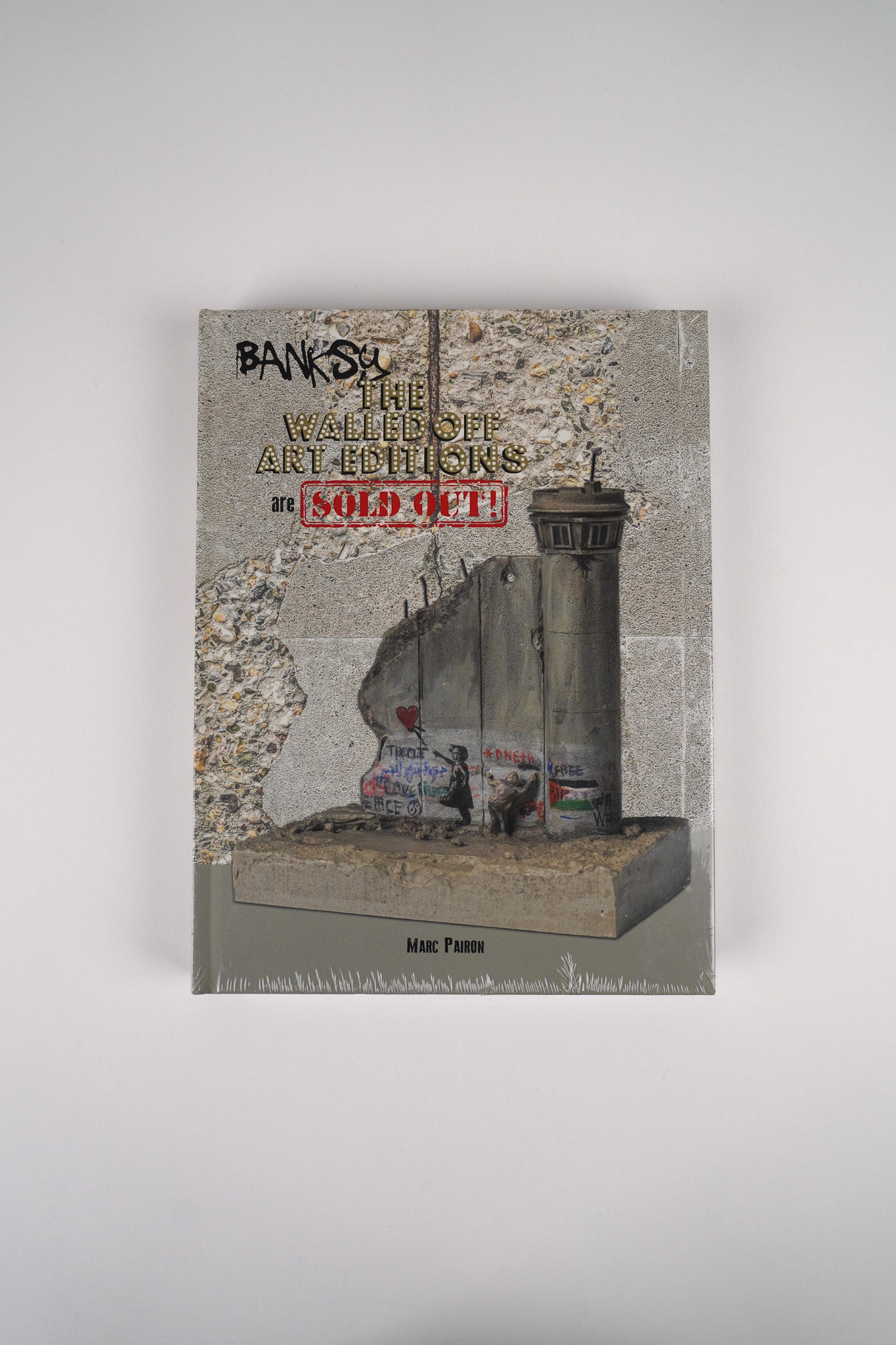 Front cover of the book "Banksy: The Walled Off Art Editions Are Sold Out" by Marc Pairon, showcasing the title and design.