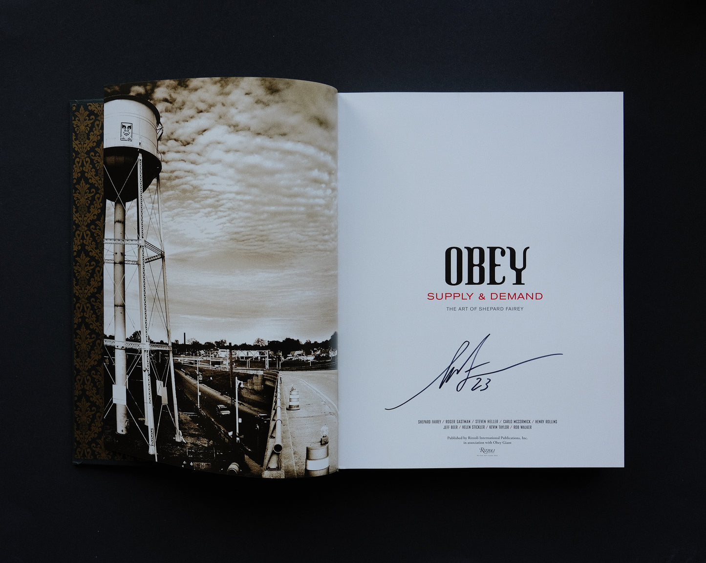 Title page of 'Obey: Supply & Demand - The 20 Year Edition' signed by Shepard Fairey.