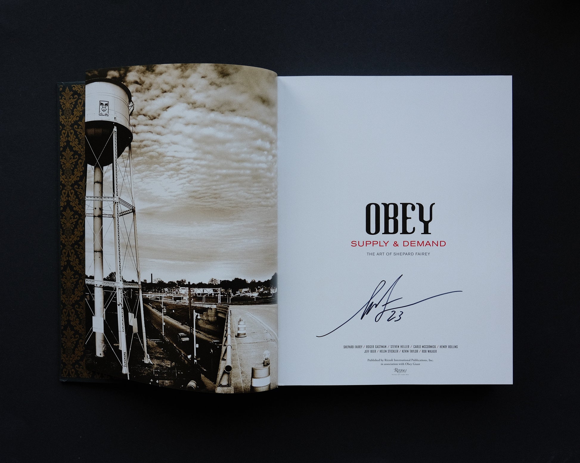 Title page of 'Obey: Supply & Demand - The 20 Year Edition' signed by Shepard Fairey.