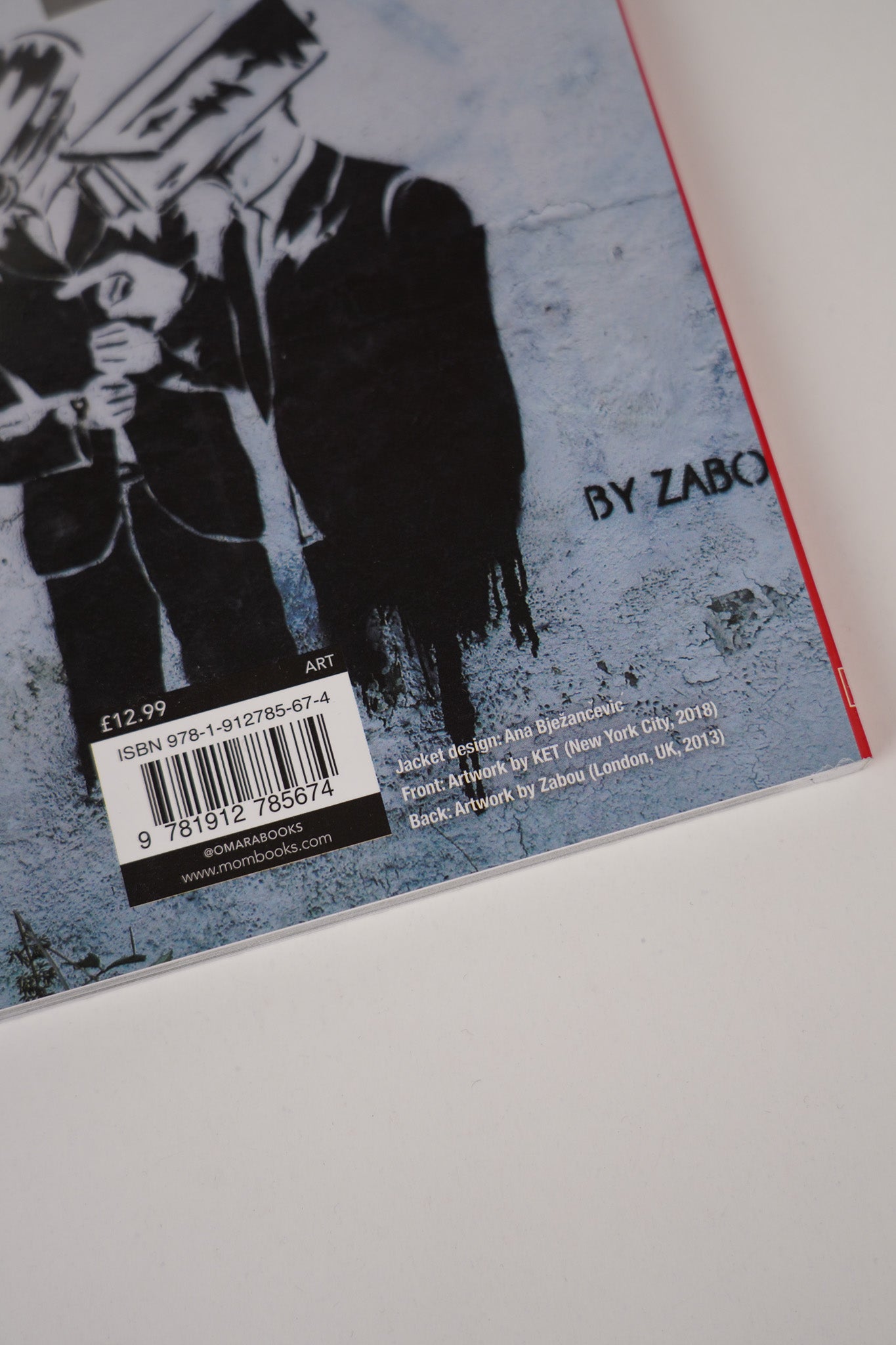 Close-up of "Planet Banksy" book details.