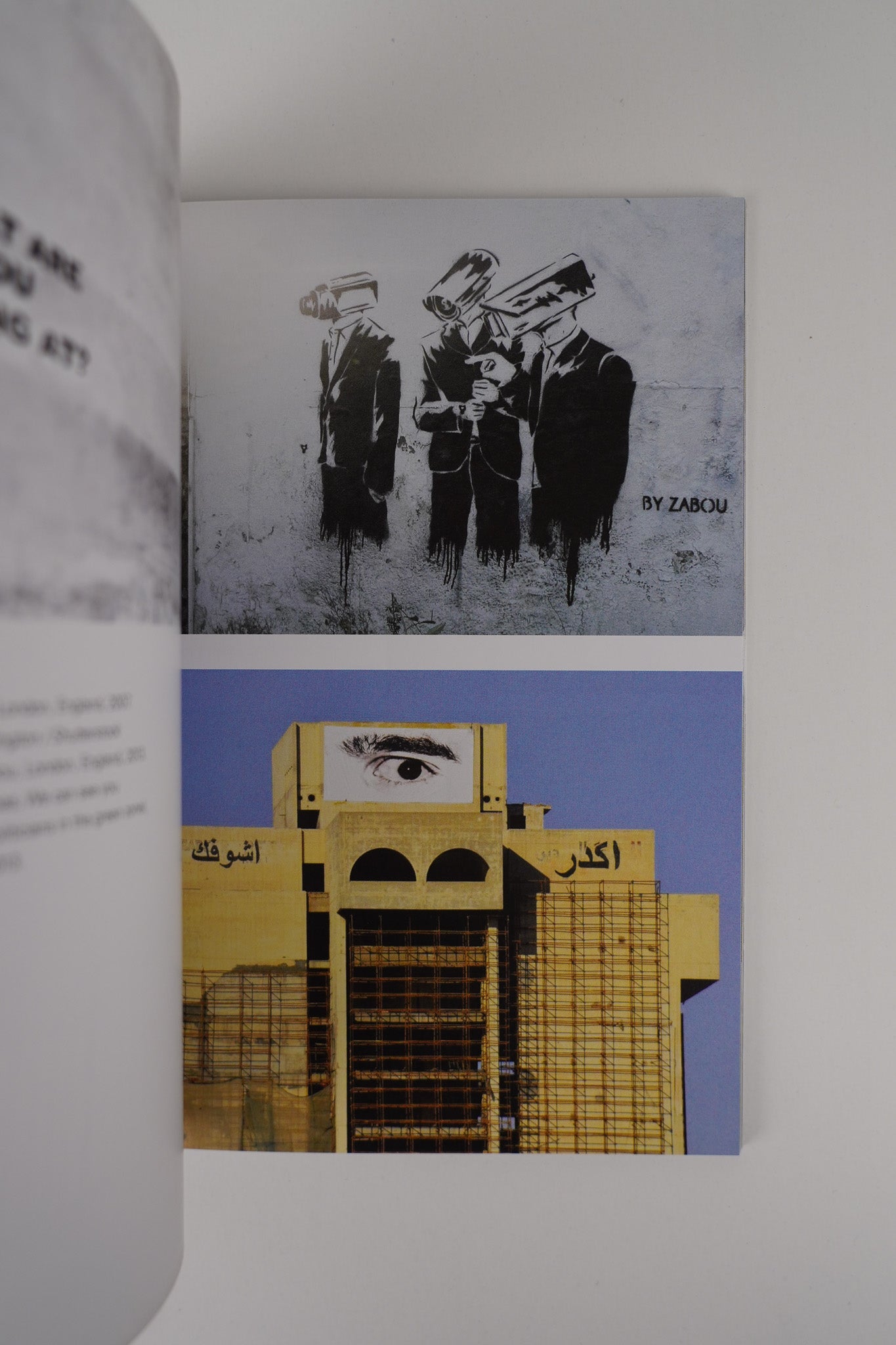 Interior spread of "Planet Banksy," featuring curated images of urban art and its social messages.